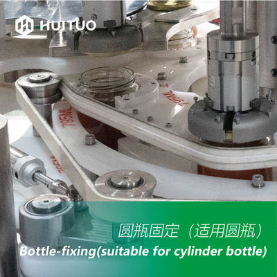 La botella de cristal rotatoria automática concentra la capsuladora de la máquina de Honey Twist Off Servo Capping