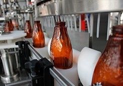 Máquina que capsula de la botella del champú del pelo de la loción de la bomba cónica del dispensador con el sistema del duende malicioso