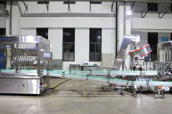 Máquina que capsula automática de Huituo 7200bph para el aceite de bebé redondo del casquillo